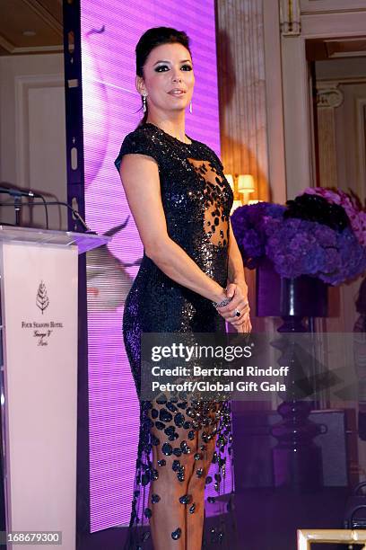 Eva Longoria presents 'Global Gift Gala' at Hotel George V on May 13, 2013 in Paris, France.