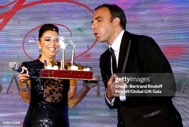 Eva Longoria gives a Birthday Cake to Nikos Aliagas which has 44 years old today - 'Global Gift Gala' at Hotel George V on May 13, 2013 in Paris,...