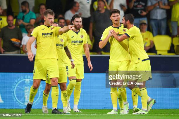 Alexander Sorloth of Villareal FC celebrates with his teammates after scoring the team's second goal during the LaLiga EA Sports match between...