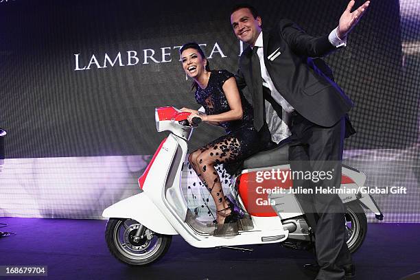 Eva Longoria performs on stage during the 'Global Gift Gala' at Hotel George V on May 13, 2013 in Paris, France.