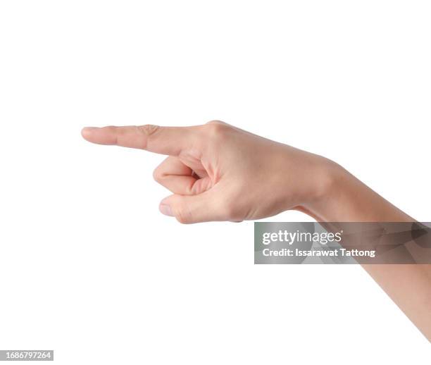 woman's hand touching or pointing to something isolated on white background. close up. high resolution product - hand pointing ストックフォトと画像