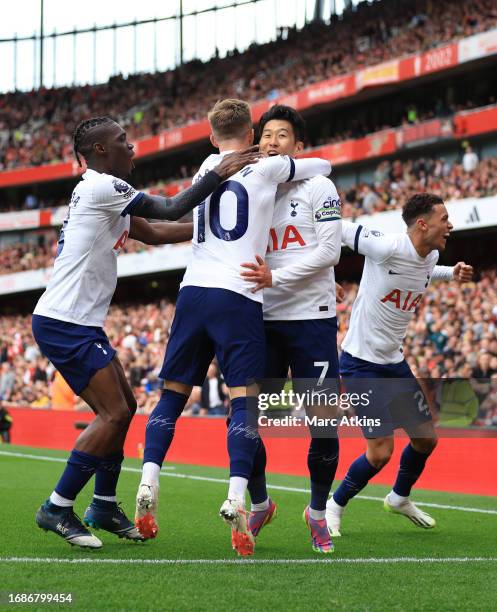 Son Heung-min of Tottenham Hotspur celebrates scoring his 2nd goal with team mates during the Premier League match between Arsenal FC and Tottenham...