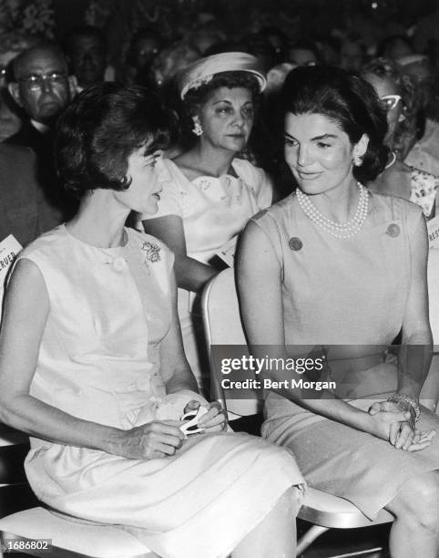 First Lady Jacqueline Kennedy sits in an audience beside American socialite Jayne Wrightsman at the Hotel Biltmore, Palm Beach, Florida, March 1961.