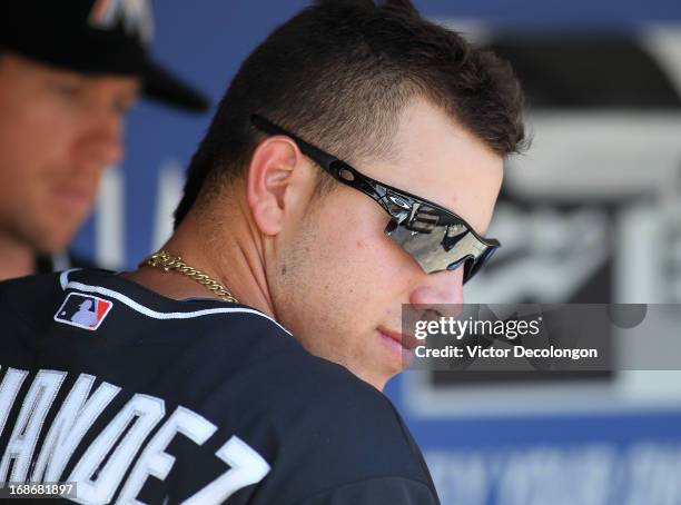 Pitcher Jose Fernandez of the Miami Marlins looks on from the dugout during the MLB game against the Los Angeles Dodgers at Dodger Stadium on May 12,...