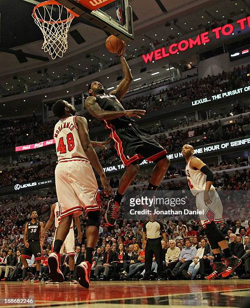 LeBron James of the Miami Heat shoots against Nazr Mohammed of the Chicago Bulls in Game Four of the Eastern Conference Semifinals during the 2013...