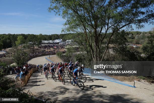 Riders compete in the Men's Elite Cross Country mountain biking test event, at Elancourt Hill, in Elancourt, west of Paris, on September 24, 2023.
