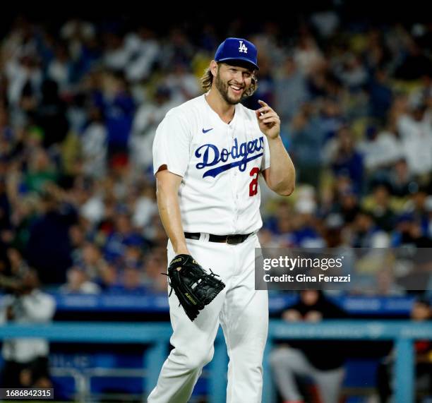 Los Angeles Dodgers starting pitcher Clayton Kershaw reacts after Los Angeles Dodgers left fielder David Peralta makes a diving catch to end the...