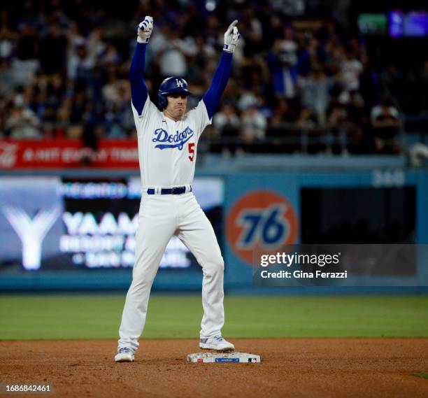 Los Angeles Dodgers first baseman Freddie Freeman reacts towards the dugout after hitting a double against the San Francisco Giants at Dodger Stadium...