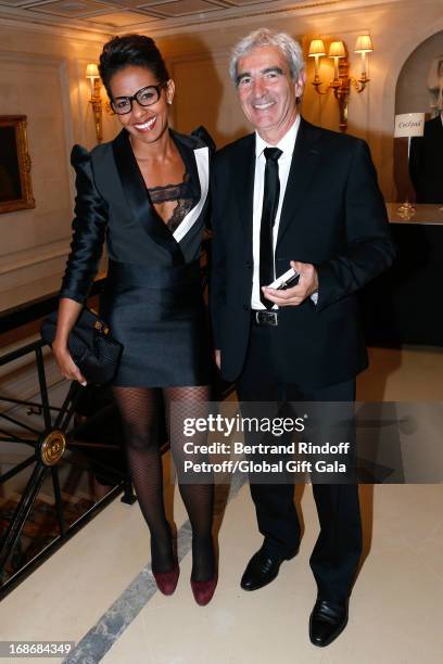 Audrey Pulvar and Raymond Domenech attend 'Global Gift Gala' at Hotel George V on May 13, 2013 in Paris, France.