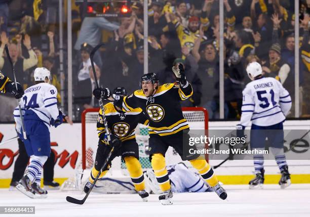 Tyler Seguin of the Boston Bruins celebrates following teammate Patrice Bergeron's of the Boston Bruins game-winning goal in overtime against the...