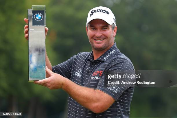 Ryan Fox of New Zealand poses with the trophy following victory on Day Four of the BMW PGA Championship at Wentworth Golf Club on September 17, 2023...