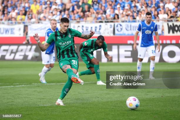 Marcel Schuhen of SV Darmstadt 98 nsaves a penalty kick from Tomas Cvancara of Borussia Moenchengladbach during the Bundesliga match between SV...