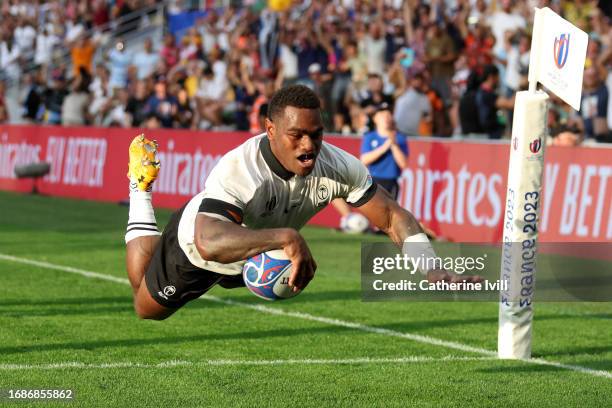 Josua Tuisova of Fiji scores his team's first try during the Rugby World Cup France 2023 match between Australia and Fiji at Stade Geoffroy-Guichard...