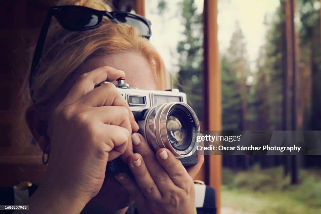 Woman with a 35mm analog camera