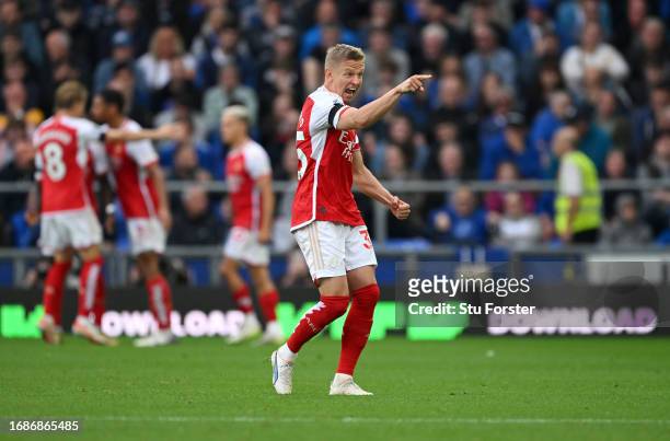 Oleksandr Zinchenko of Arsenal celebrates after teammate Leandro Trossard scores the team's first goal during the Premier League match between...