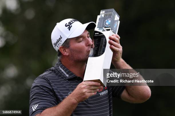 Ryan Fox of New Zealand poses with the trophy after securing victory on Day Four of the BMW PGA Championship at Wentworth Golf Club on September 17,...