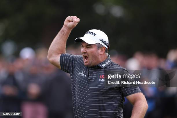 Ryan Fox of New Zealand celebrates as he holes the winning putt on the 18th green on Day Four of the BMW PGA Championship at Wentworth Golf Club on...