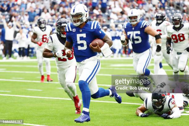 Anthony Richardson of the Indianapolis Colts scores a rushing touchdown during the first quarter against the Houston Texans at NRG Stadium on...