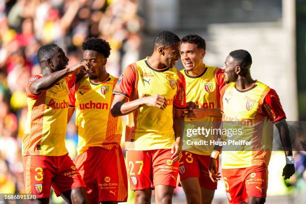 Morgan GUILAVOGUI of RC Lens celebrate his goal with teammates during the Ligue 1 Uber Eats match between Racing Club de Lens and Toulouse Football...