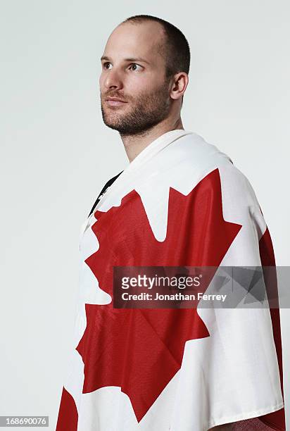 Mike Janyk poses for a portrait during the Canadian Olympic Committee Portrait Shoot on May 13, 2013 in Vancouver, British Columbia, Canada.