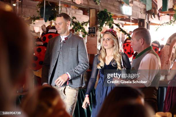 Bayern goal keeper Manuel Neuer and Anika Bissel during FC Bayern Wiesn" at the 188th Oktoberfest at Käferzelt on September 24, 2023 in Munich,...