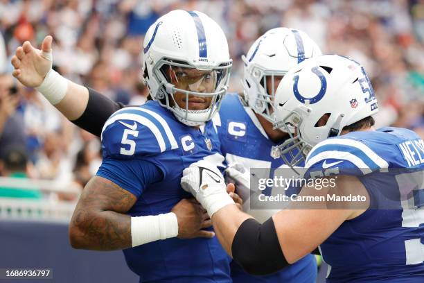 Anthony Richardson of the Indianapolis Colts celebrates a touchdown with teammates during the first quarter against the Houston Texans at NRG Stadium...