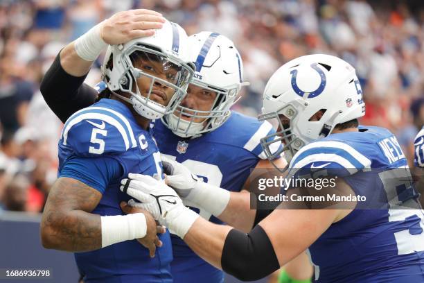 Anthony Richardson of the Indianapolis Colts celebrates a touchdown with teammates during the first quarter against the Houston Texans at NRG Stadium...