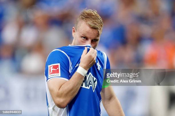 Fabian Holland of SV Darmstadt 98 looks dejected after the draw in the Bundesliga match between SV Darmstadt 98 and Borussia Mönchengladbach at...