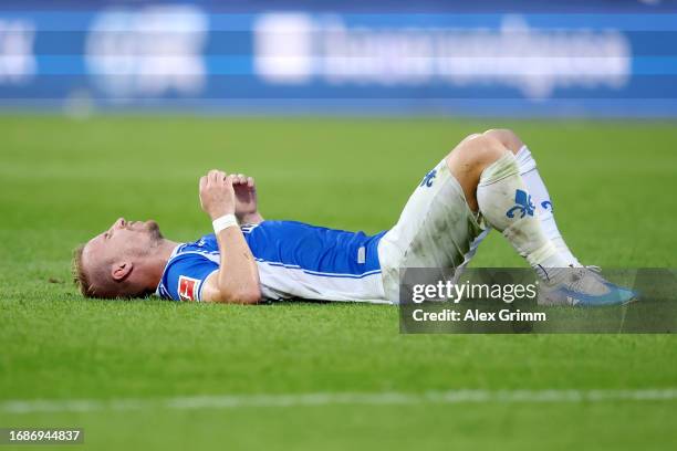 Fabian Holland of SV Darmstadt 98 looks dejected after the draw in the Bundesliga match between SV Darmstadt 98 and Borussia Mönchengladbach at...