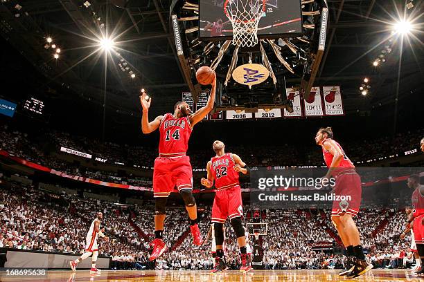 Daequan Cook of the Chicago Bulls grabs a rebound against the Miami Heat in Game Two of the Eastern Conference Semifinals during the 2013 NBA...