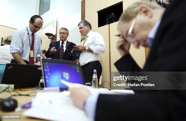 Treasurer Wayne Swan talks over the details of the budget with members of the media held in 'Budget lock up' on May 14, 2013 in Canberra, Australia....