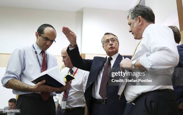 Treasurer Wayne Swan talks over the details of the budget with members of the media held in 'Budget lock up' on May 14, 2013 in Canberra, Australia....