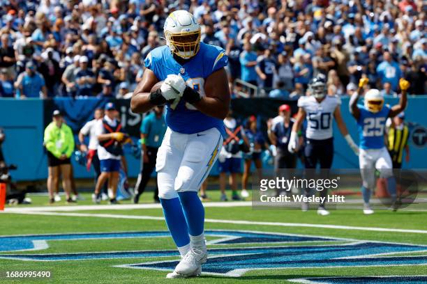Trey Pipkins III of the Los Angeles Chargers catches a two point conversion during the second quarter against the Tennessee Titans at Nissan Stadium...