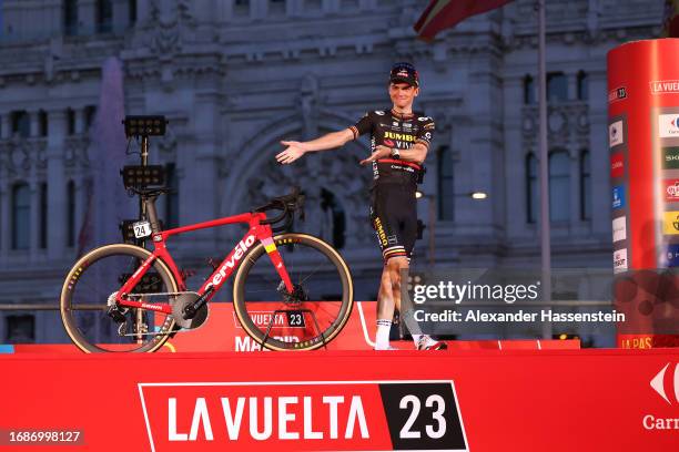 Sepp Kuss of The United States and Team Jumbo-Visma - Red Leader Jersey celebrates at podium as final overall race winner during the 78th Tour of...