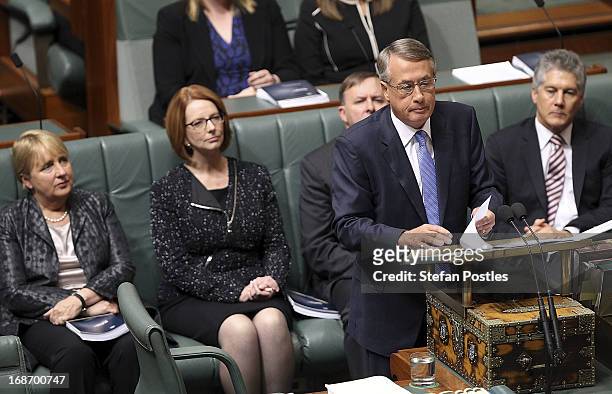 Treasurer Wayne Swan delivers the budget in the House of Representatives chamber on May 14, 2013 in Canberra, Australia. Treasurer Wayne Swan will...