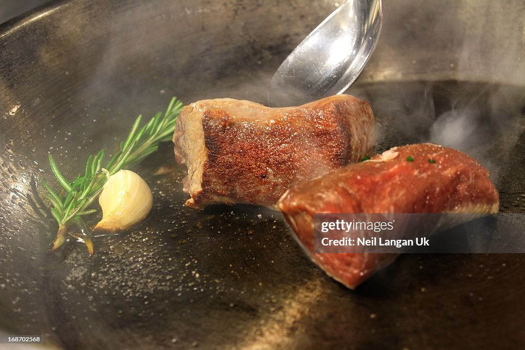 Searing lamb fillet in smoking hot pan