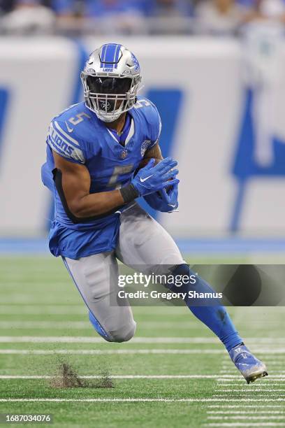 David Montgomery of the Detroit Lions runs the ball during the third quarter in the game against the Seattle Seahawks at Ford Field on September 17,...