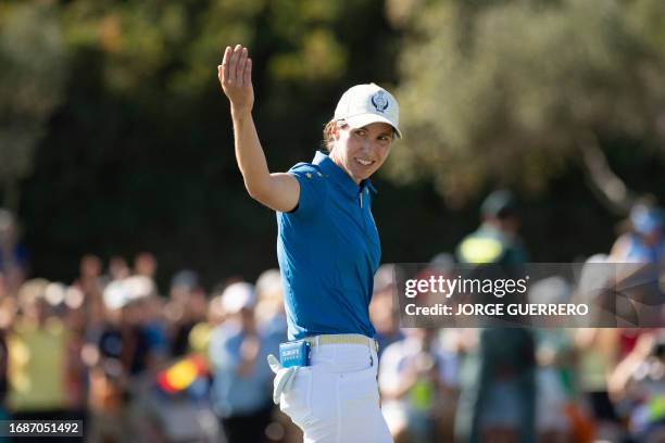 Team Europe's Spanish golfer Carlota Ciganda waves on the last day of the 2023 Solheim Cup biennial team golf competition at Finca Cortesin golf club...