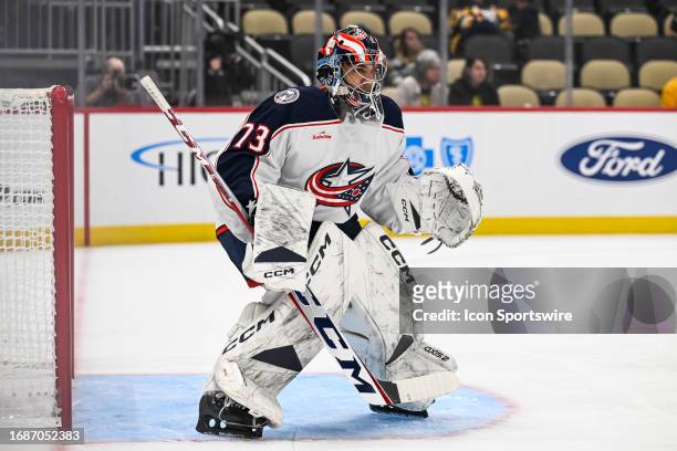 Columbus Blue Jackets goalie Jet Greaves tends net during the first period in the preseason NHL game between the Pittsburgh Penguins and the Chicago...