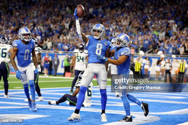 Josh Reynolds of the Detroit Lions celebrates a touchdown during the fourth quarter in the game against the Seattle Seahawks at Ford Field on...