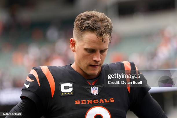 Joe Burrow of the Cincinnati Bengals walks off the field after a loss to the Baltimore Ravens at Paycor Stadium on September 17, 2023 in Cincinnati,...