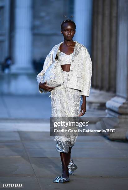 Model walks the runway at the Erdem show during London Fashion Week September 2023 at The British Museum on September 17, 2023 in London, England.