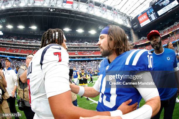 Stroud of the Houston Texans talks with Gardner Minshew of the Indianapolis Colts after the game at NRG Stadium on September 17, 2023 in Houston,...