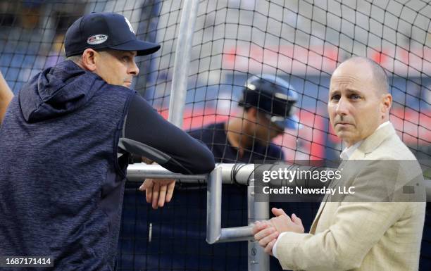 New York Yankees manager Aaron Boone and General Manager Brian Cashman at the batting cage during warmups at the AL Wild Card Game on Oct. 3 at...