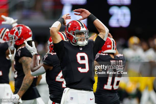 Desmond Ridder of the Atlanta Falcons reacts after a play during the fourth quarter in the game against the Green Bay Packers at Mercedes-Benz...