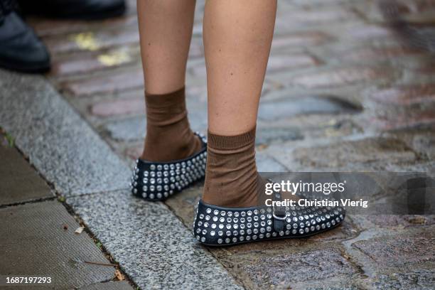 Guest is seen wearing studded flat shoes outside Holzweiler during London Fashion Week September 2023 at the on September 17, 2023 in London, England.