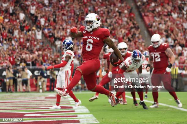 James Conner of the Arizona Cardinals scores a touchdown during the first quarter in the game against the New York Giants at State Farm Stadium on...