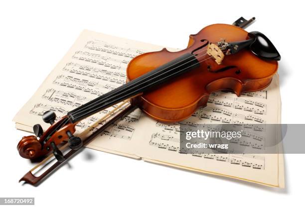 violin and bow with sheet music - violin stock pictures, royalty-free photos & images