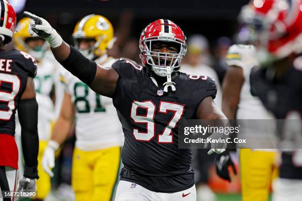 Grady Jarrett of the Atlanta Falcons reacts after a play during the fourth quarter in the game against the Green Bay Packers at Mercedes-Benz Stadium...