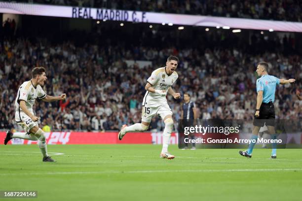 Federico Valverde of Real Madrid celebrates after scoring their sides first goal during the LaLiga EA Sports match between Real Madrid CF and Real...